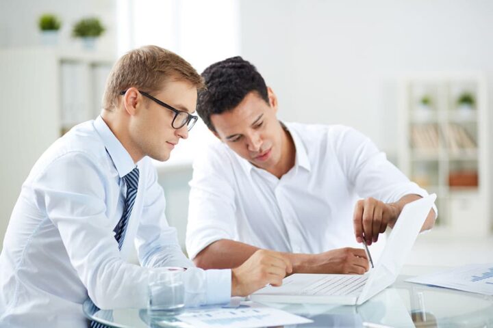 Two agents working together and collaborating on some paperwork