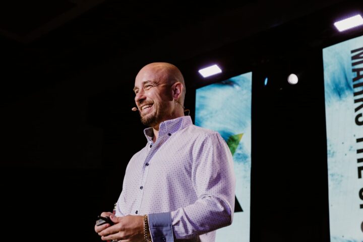 Experior CEO, Jamie Prickett, talking on stage