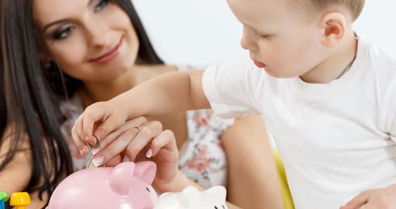 A young mother looking at her baby