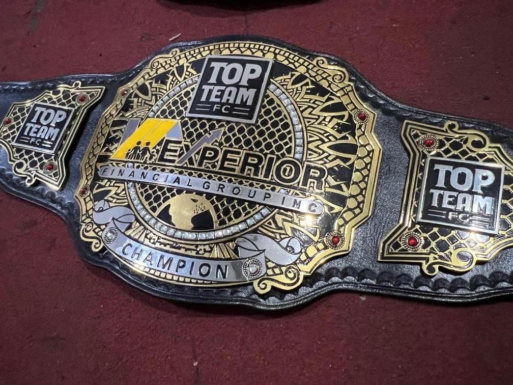 A championship belt featuring Experiors logo