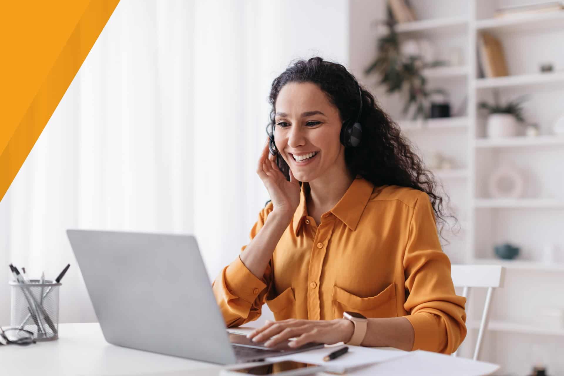 Woman in headset conducting virtual insurance webinar from home.