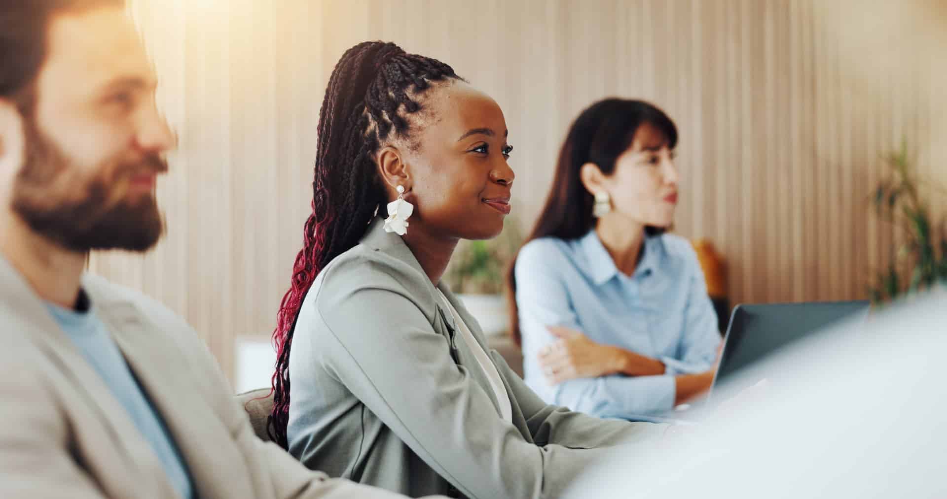 Diverse insurance agents listening during an MGA training session